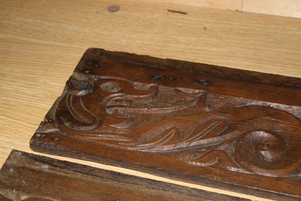 Three 19th century Continental carved oak corbels, carved with lion masks and a pair of scroll and dragon carved frieze panels